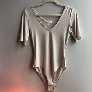 Deep V-neck long sleeve bodysuit